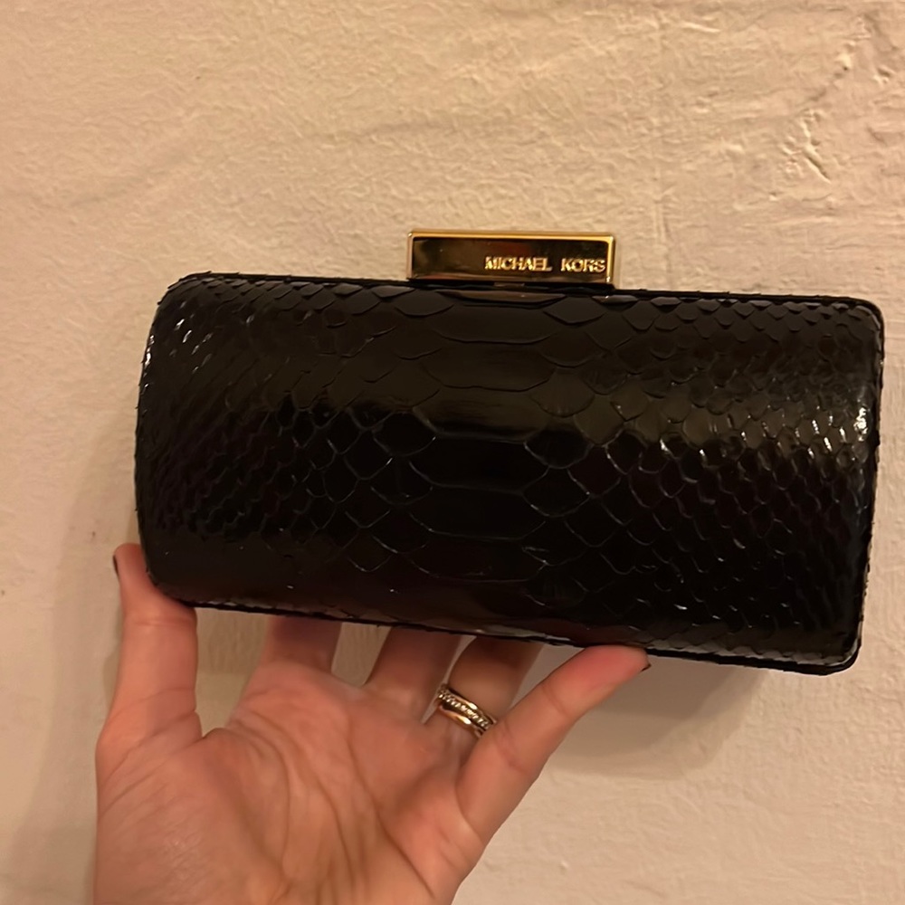 Hard sided block and gold snake skin clutch!